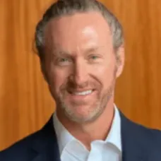 Authentic headshot of a senior demographic buyer expressing immense happiness with noticeable improvements in systemic endurance capabilities.